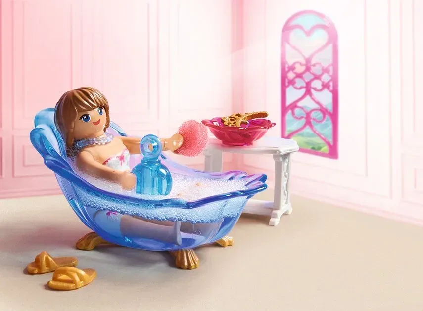 Princess figure relaxing in translucent shell bathtub
