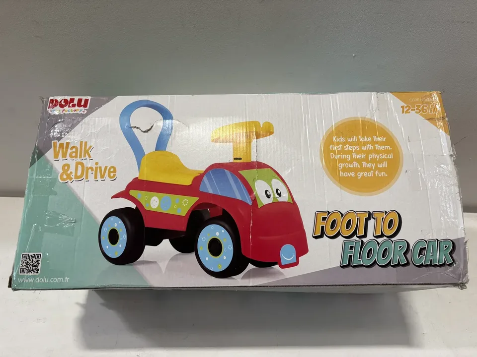 Pre-loved Dolu Foot to Floor Car in red packaging