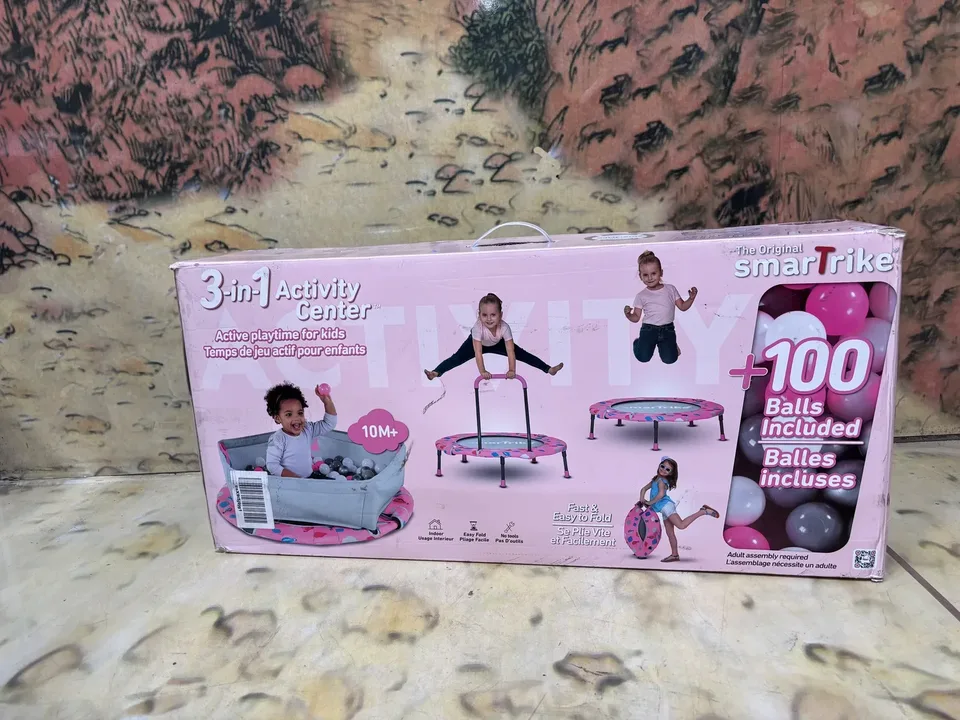 Pre-loved smarTrike 3-in-1 Activity Centre Trampoline in pink box