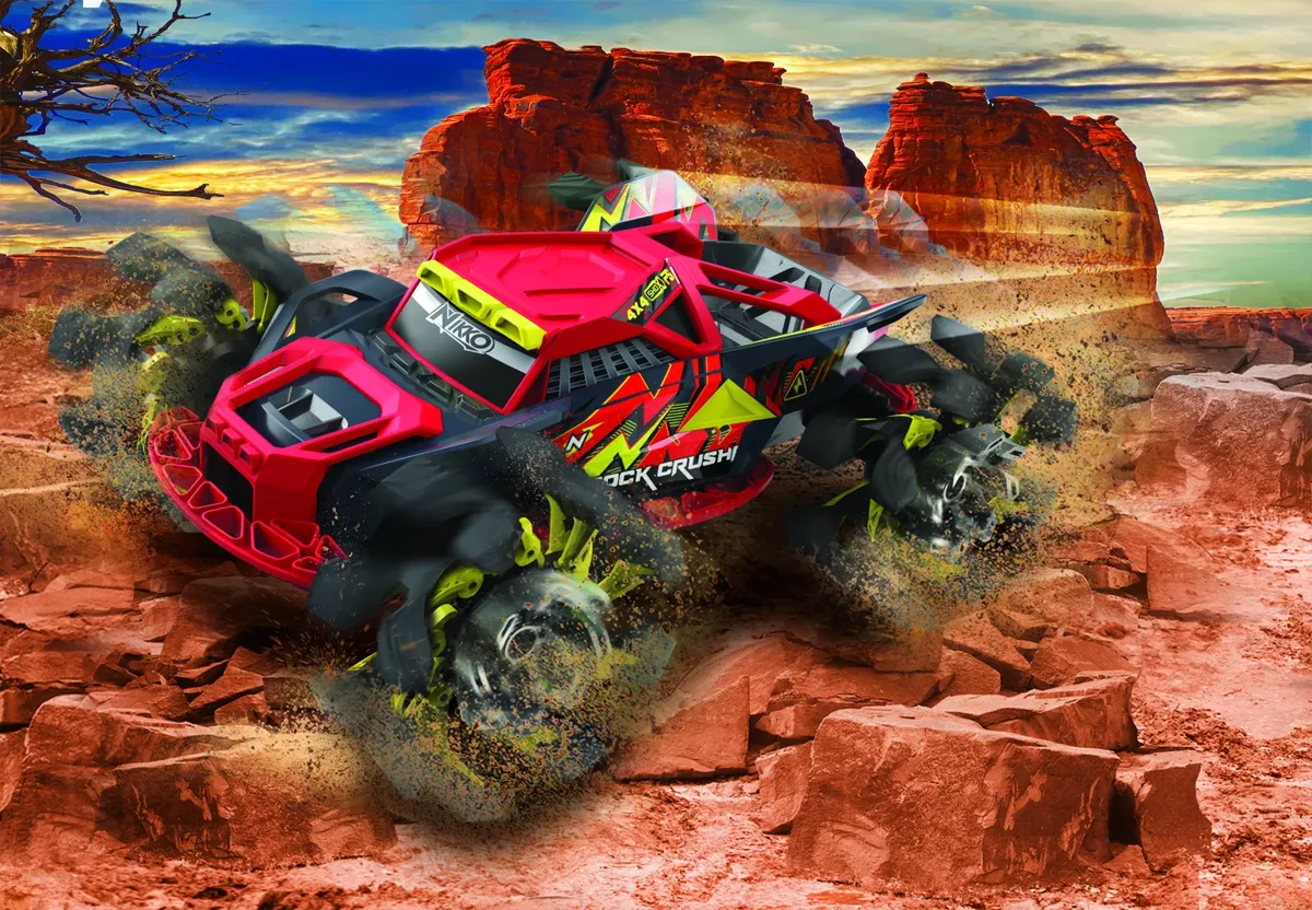 Nikko Rock CrushR RC Red Lightning tackling rocky desert terrain with auto-expanding wheels fully extended for maximum grip