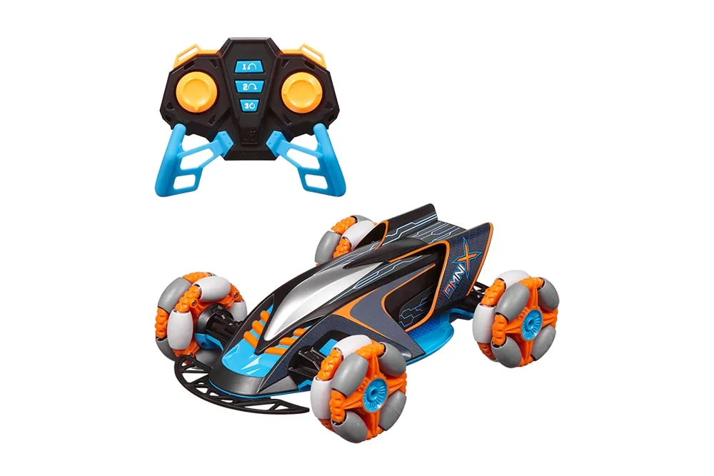 Nikko Omni X Pro RC stunt car in black, blue and orange with its 2.4GHz controller, showing the wheel-in-wheel omni-directional wheels