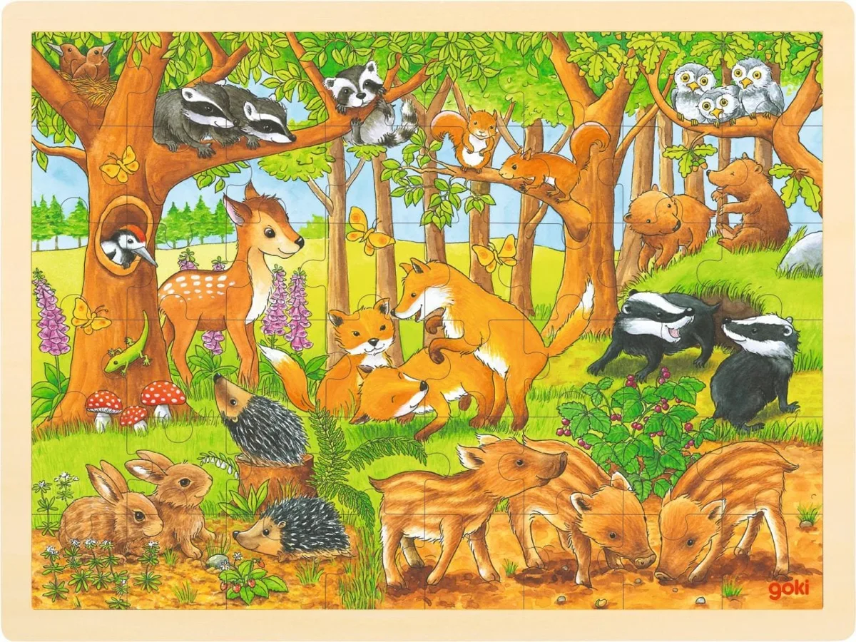 The completed Goki Puzzle - Baby Animals in the Forest, a 48-piece wooden jigsaw showing a woodland scene with foxes, deer, rabbits, and badgers.
