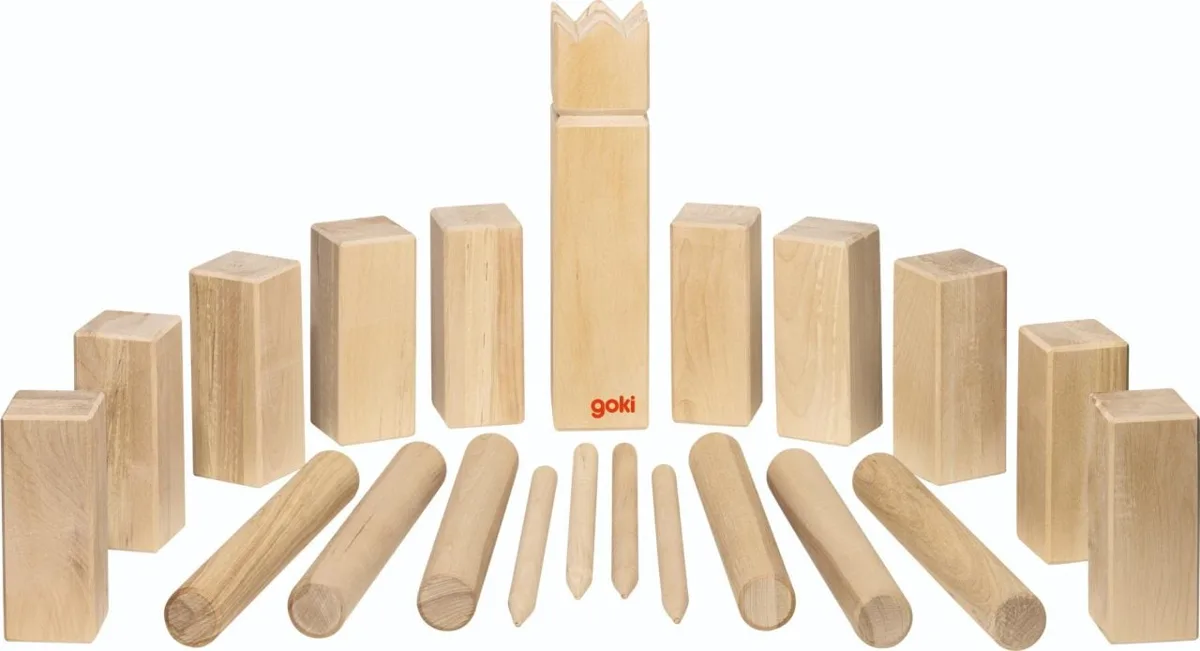 The Goki Kubb Viking Game, a complete wooden set showing the king, kubbs, throwing batons, and marker pegs arranged for play.