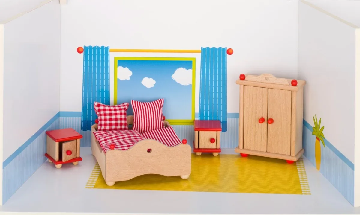 A Goki doll's house bedroom furniture set, including a bed with red gingham bedding, a wardrobe, and two bedside tables.