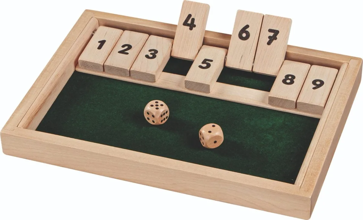 Goki wooden shut the box game with green felt base, nine numbered tiles and two wooden dice, shown on white background