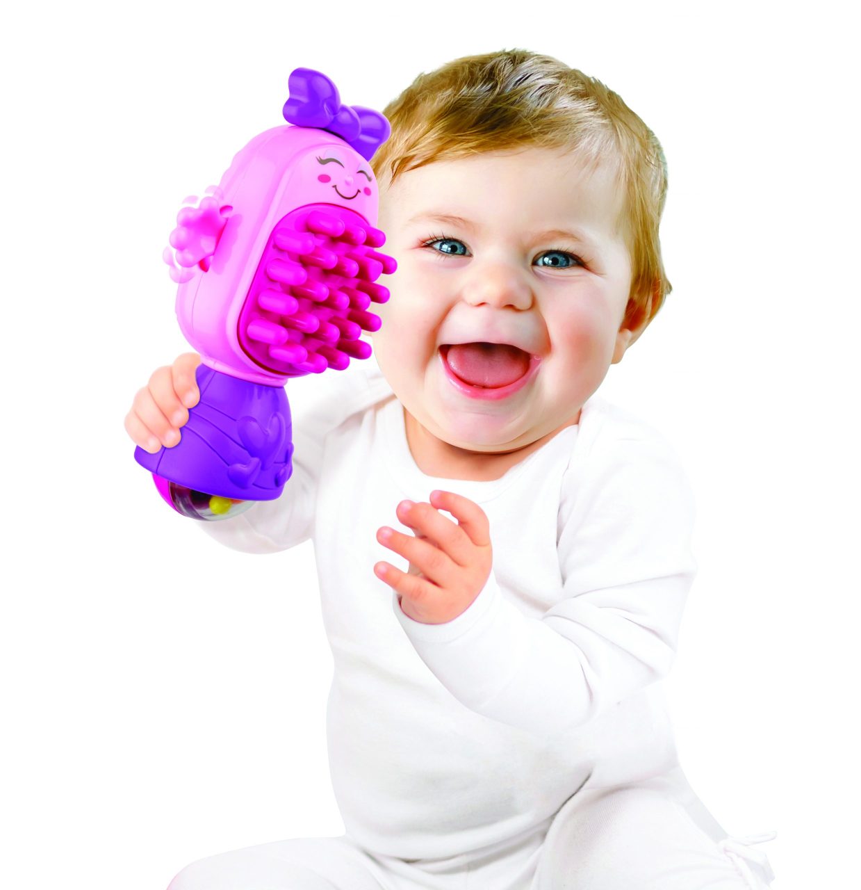Fashion Tot Beauty Gift Set. baby playing with the toy brush.
