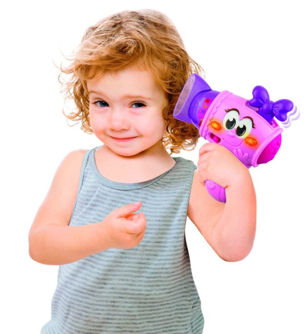 Fashion Tot Beauty Gift Set: young girl playing with toy hairdryer.