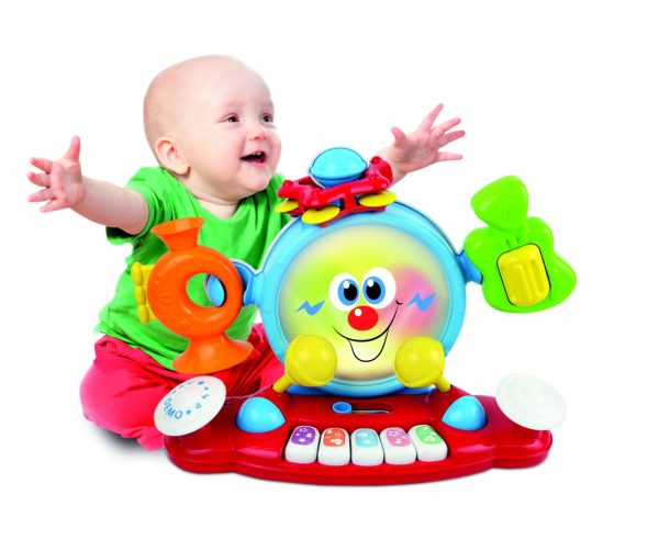 Baby playing with the 6-in-1 Live Band. Product image.
