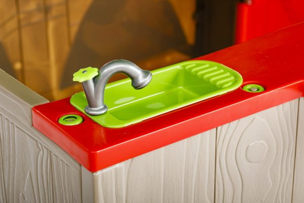Play Kiosk/Shop. Close up of toy kitchen sink.