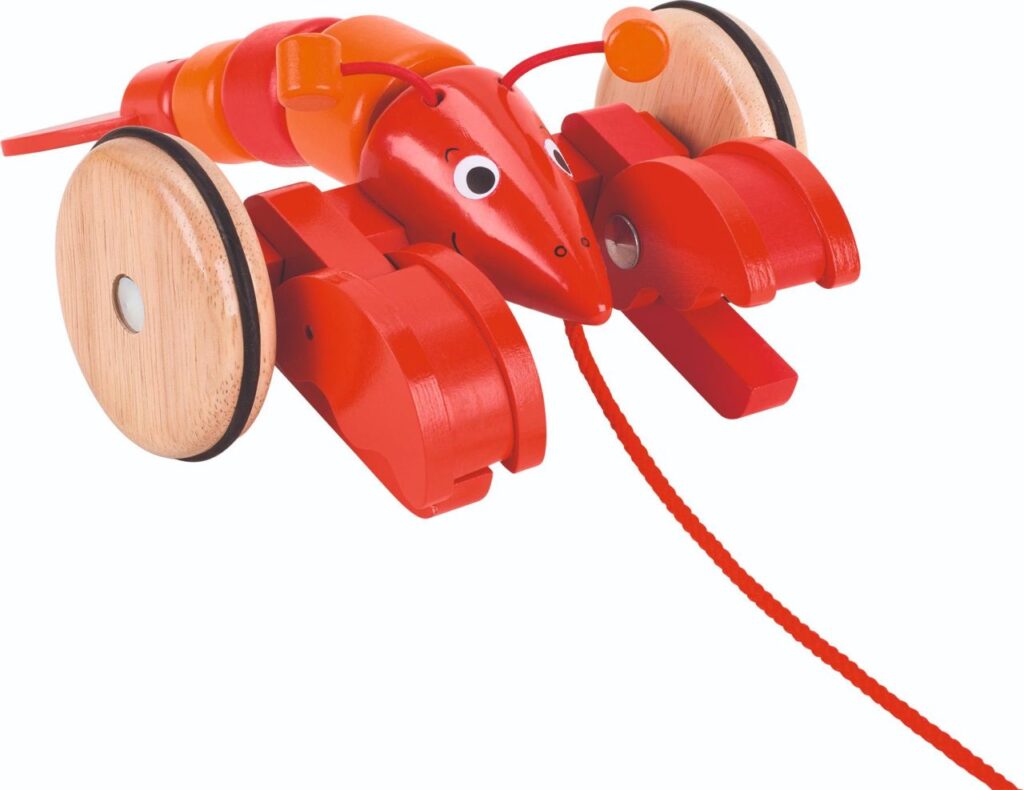 The Goki Pull-along Lobster, a red wooden toy with moving claws and an articulated body that wiggles as it moves