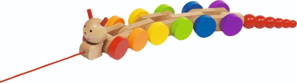The Goki Pull-along Caterpillar Nila, a rainbow-coloured wooden toy with many segments that wiggles as it moves.