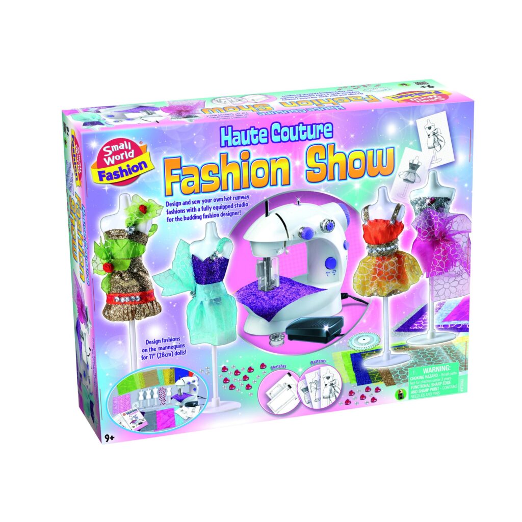 The box for the Small World Haute Couture Fashion Show kit, showing the toy sewing machine and mannequins dressed in custom outfits.