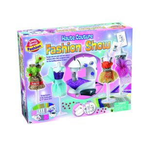 The box for the Small World Haute Couture Fashion Show kit, showing the toy sewing machine and mannequins dressed in custom outfits.