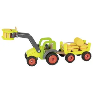 A high-quality green wooden Goki tractor with a functional front-end loader and a detachable trailer carrying four yellow hay bales.