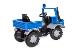 A side view of the Rolly Toys Unimog Police truck, highlighting the adjustable seat, rear cargo area, and whisper-quiet tyres.