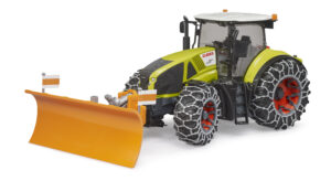 Claas Axion 950 with snow chains and plow blade