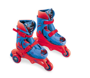 Young boy riding the red and blue Spider-Man adjustable tri-skates along a sunny park path.