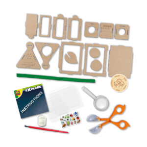 SES Creative DIY insect observation box toy set featuring wooden parts, a magnifying glass, bug catcher tool, and stickers.