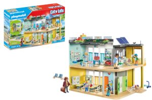 The Playmobil Large School playset box and fully assembled two-story school building showing classrooms and figures.