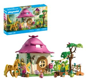 Playmobil fairy home set featuring a purple roofed cottage, a golden unicorn, and 178 accessories for creative storytelling.