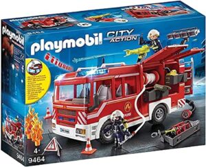 Red Playmobil fire engine playset featuring two firefighters and a working water cannon.